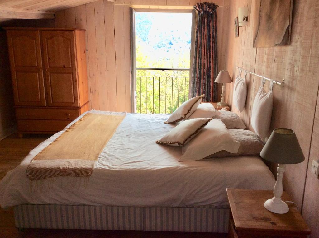 Postel nebo postele na pokoji v ubytování Mas le Nogier Gites Apartments