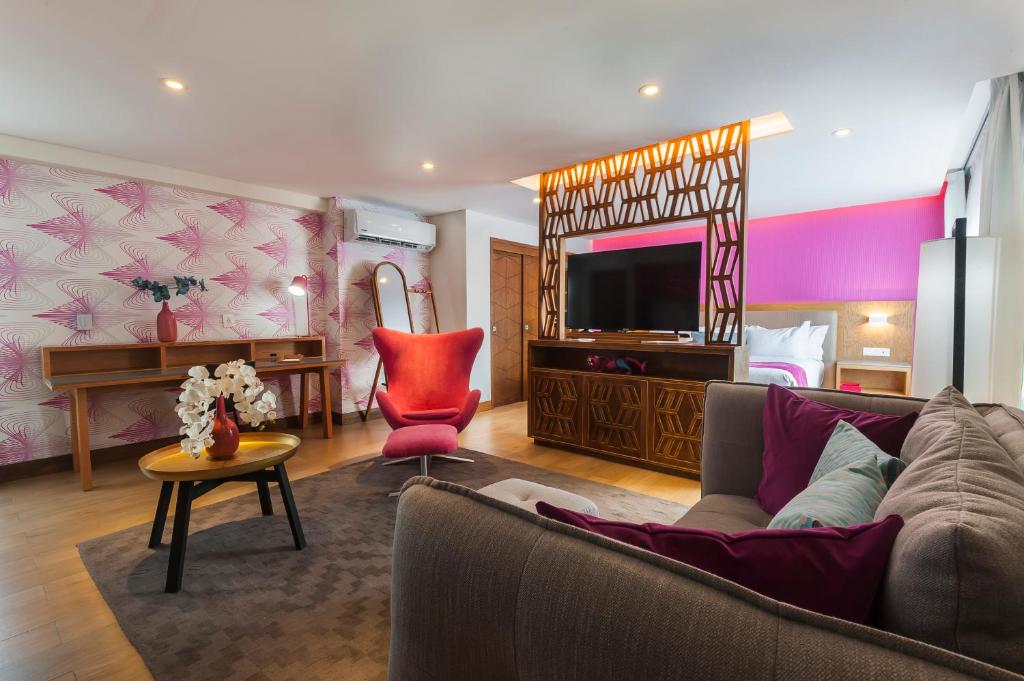 TV a/nebo společenská místnost v ubytování FCH Hotel Providencia