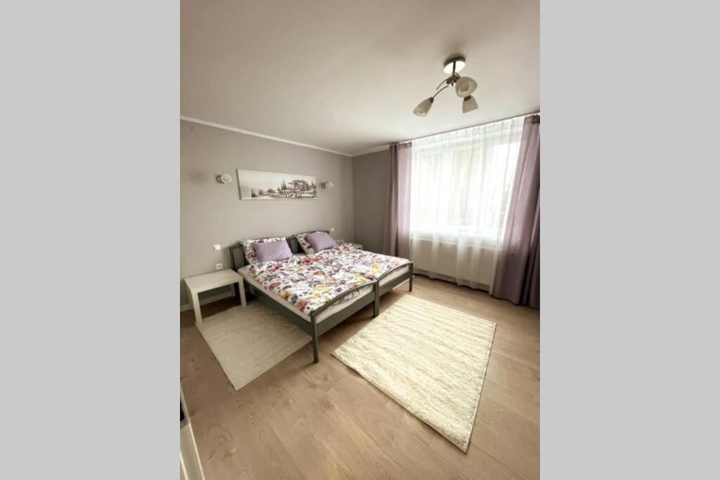 Posteľ alebo postele v izbe v ubytovaní Modern apartment in Tarnow