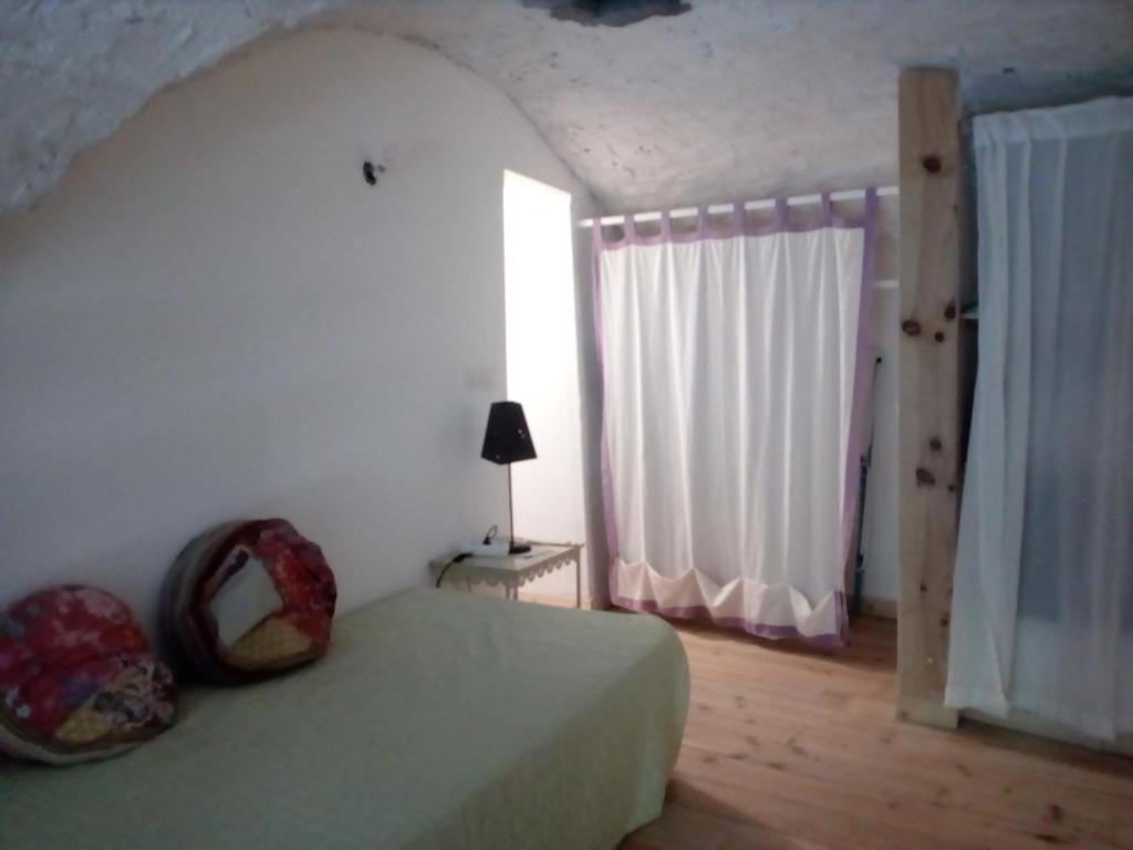 Postel nebo postele na pokoji v ubytování L'Olivier