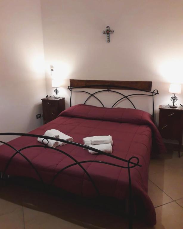 Postel nebo postele na pokoji v ubytování La Locanda del Baffo