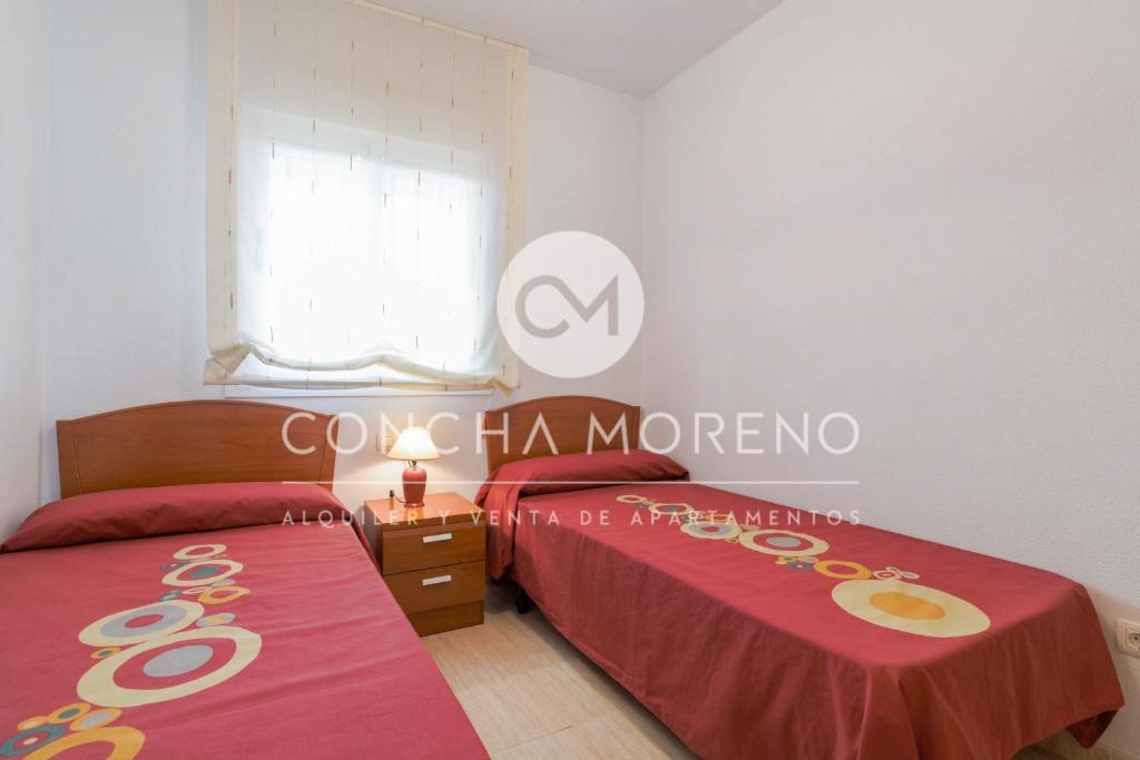 Postel nebo postele na pokoji v ubytování Costa Caribe I-II CM