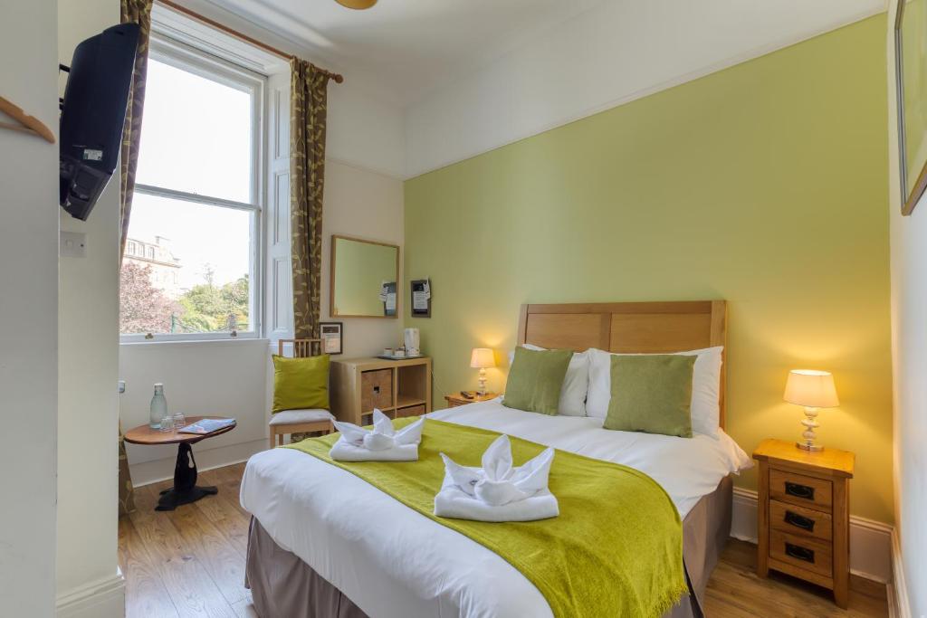 Postel nebo postele na pokoji v ubytování No32 Hotel