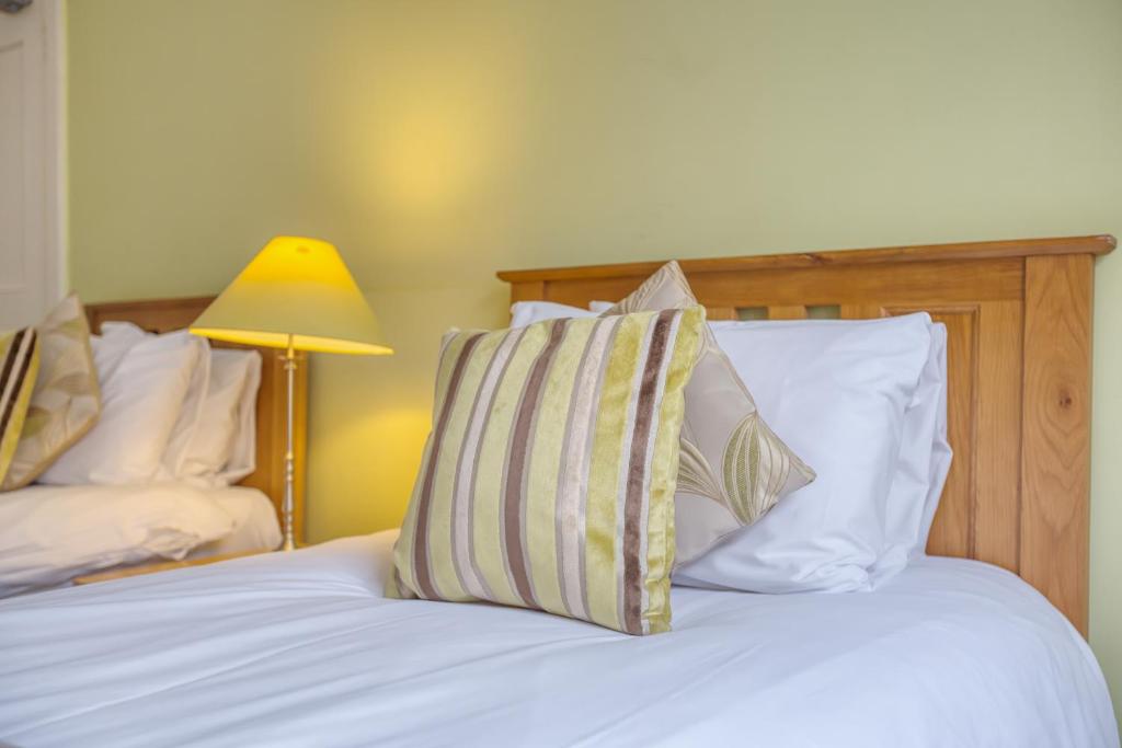 Postel nebo postele na pokoji v ubytování No32 Hotel