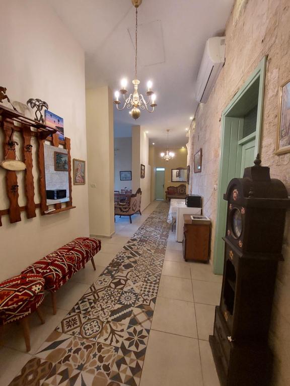 TV a/nebo společenská místnost v ubytování Al Bishara Guest House
