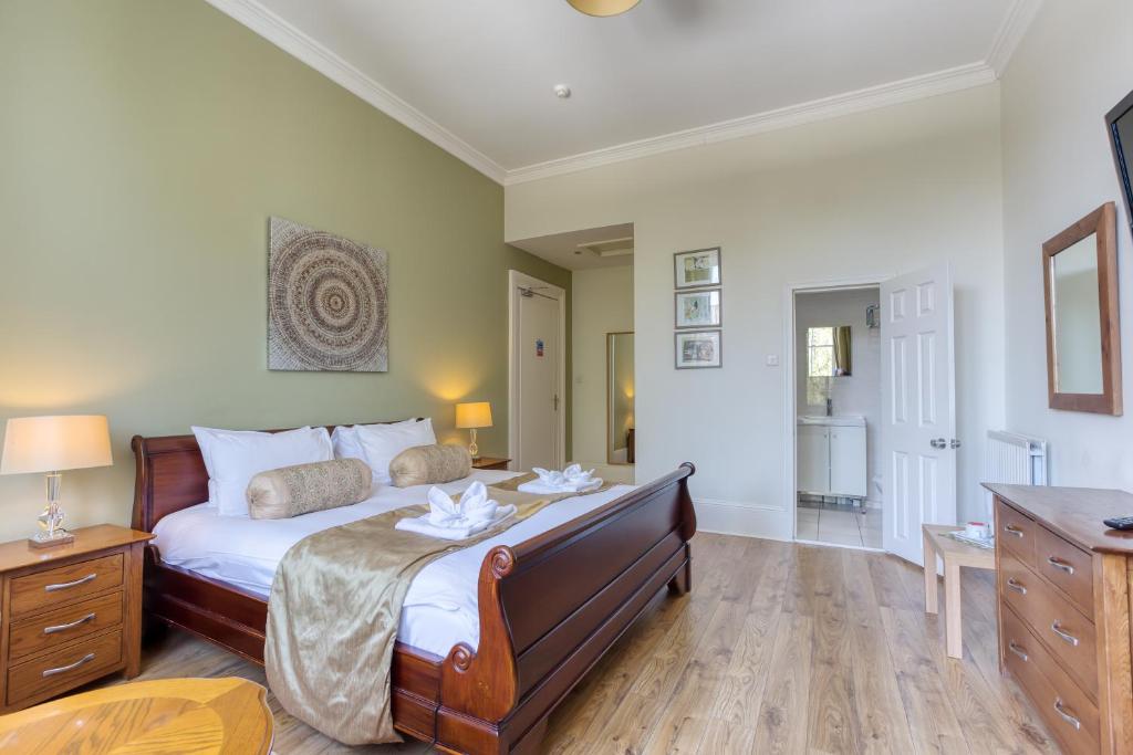 Postel nebo postele na pokoji v ubytování No32 Hotel