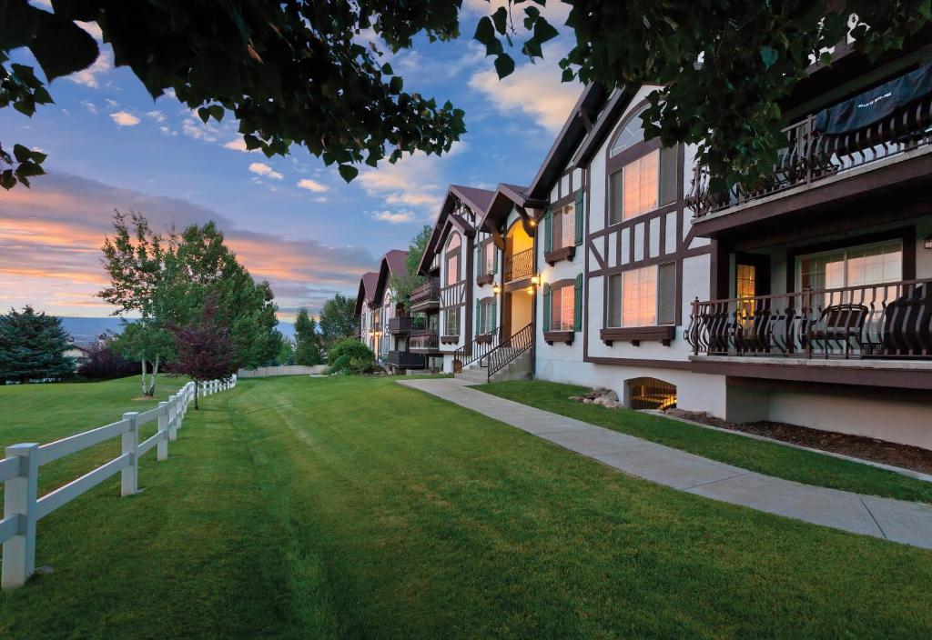 a row of houses with a white fence at WorldMark Midway in Midway