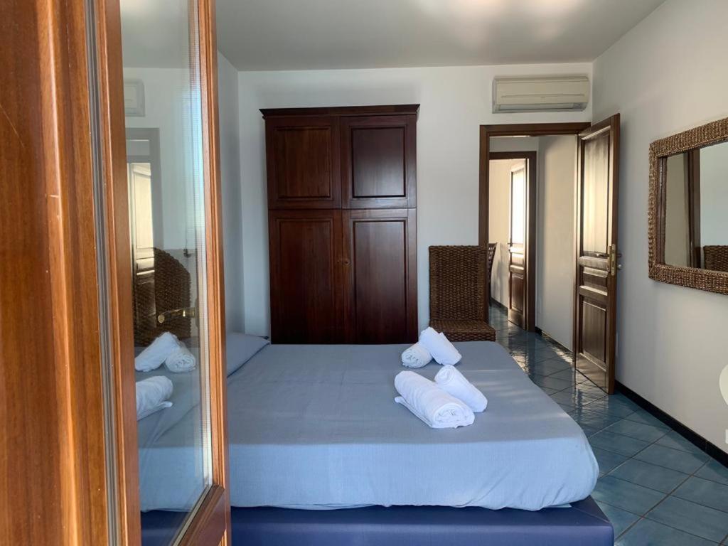 Postel nebo postele na pokoji v ubytování Oltremare Residence Hotel