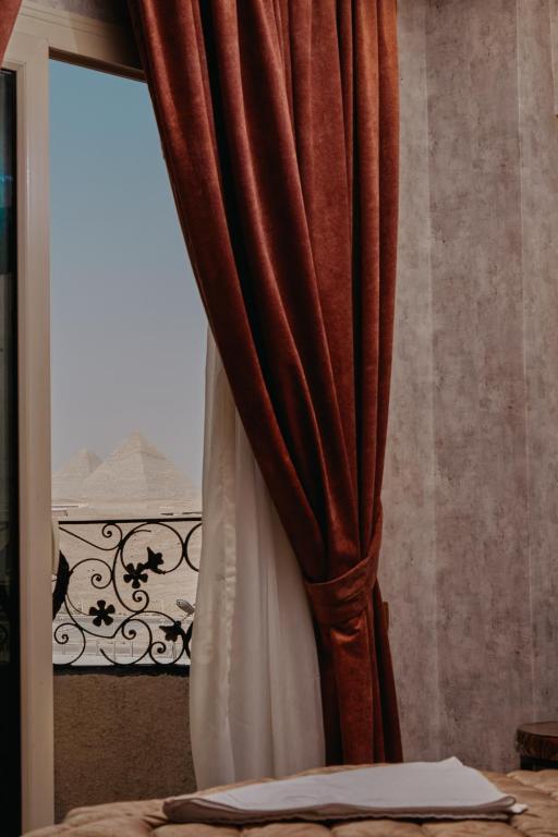 Fotografie z fotogalerie ubytování Pyramids Planet Hotel v Káhiře