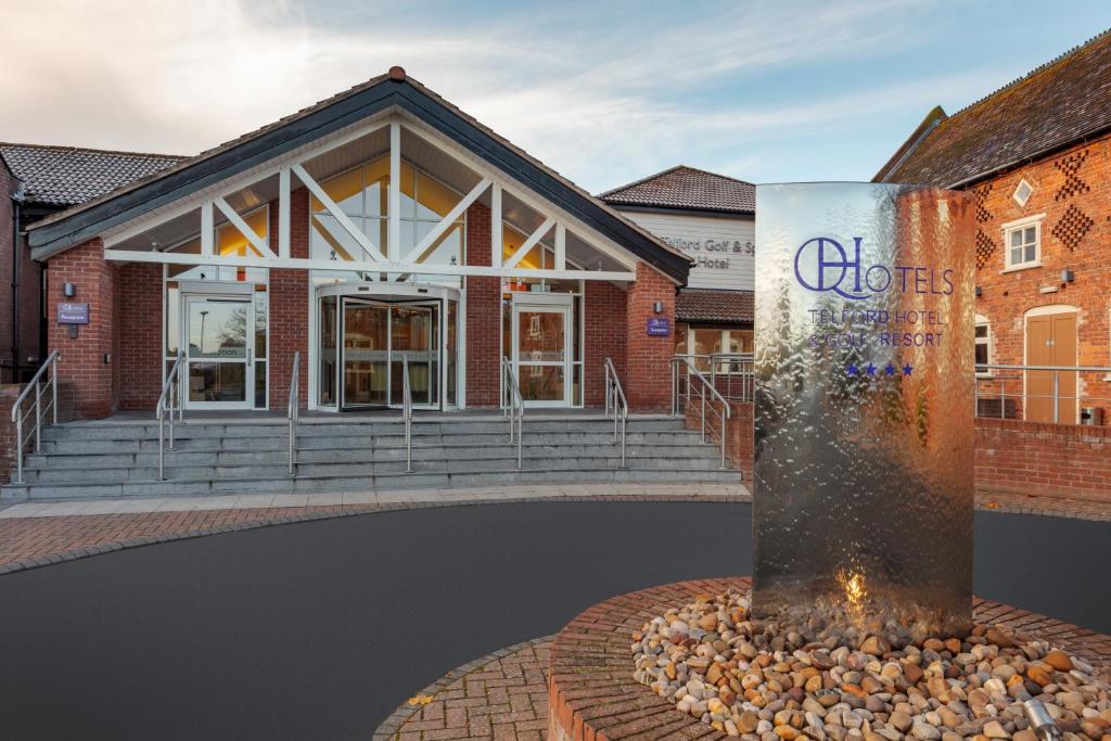 a rendering of a building with a fountain in front of it at The Telford Hotel, Spa & Golf Resort in Telford