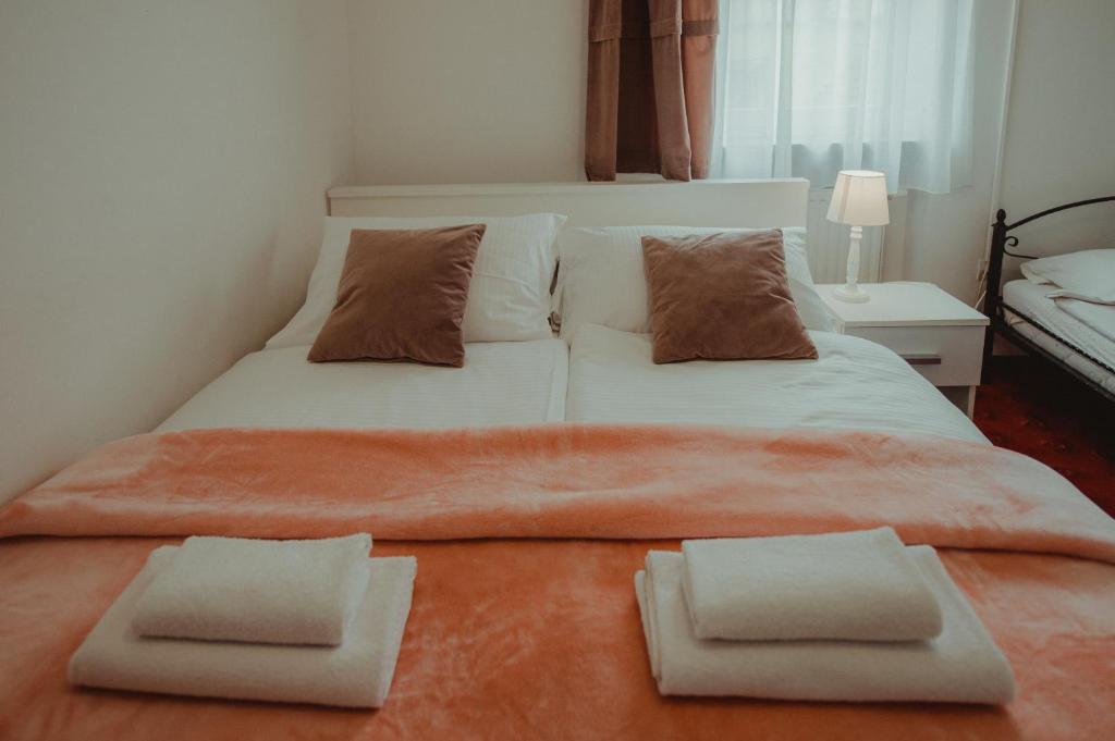 Posteľ alebo postele v izbe v ubytovaní B&B Laguna