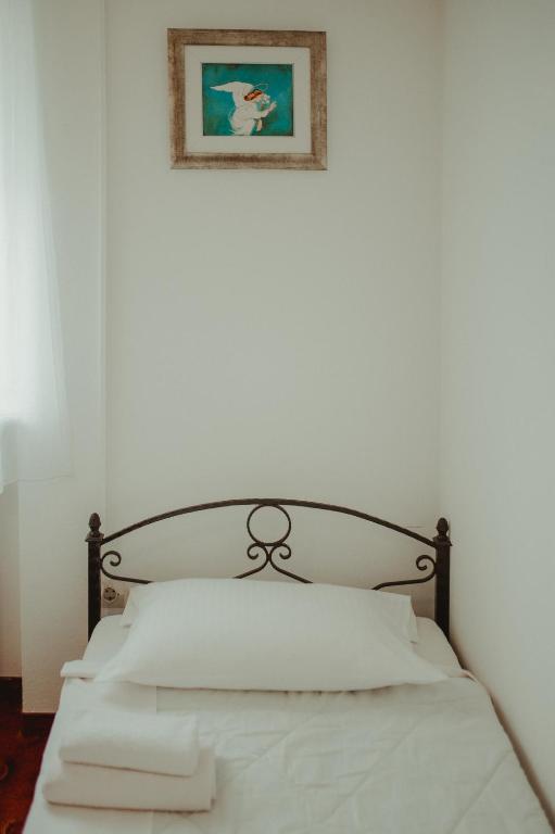 Posteľ alebo postele v izbe v ubytovaní B&B Laguna