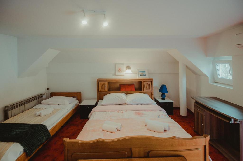 Posteľ alebo postele v izbe v ubytovaní B&B Laguna