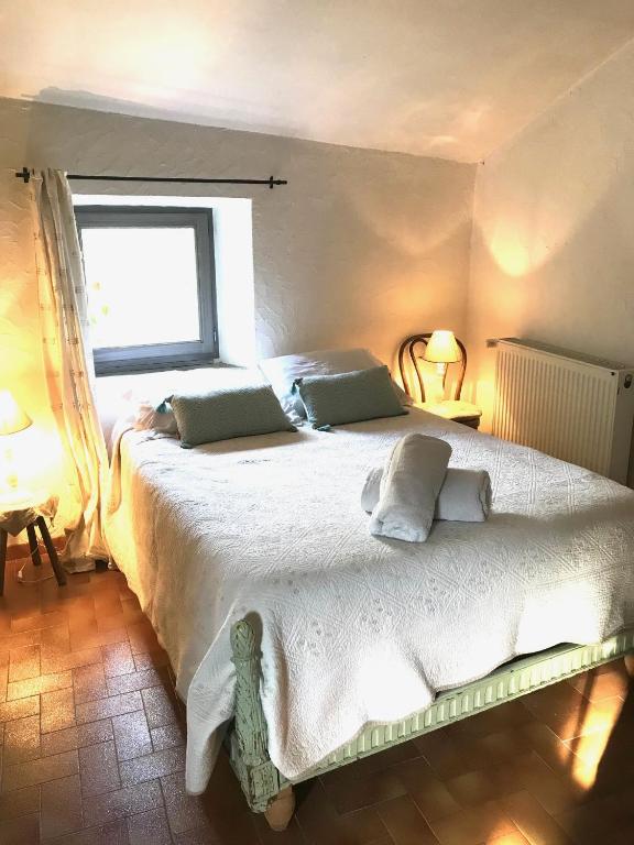 Postel nebo postele na pokoji v ubytování Mas le Nogier Gites Apartments