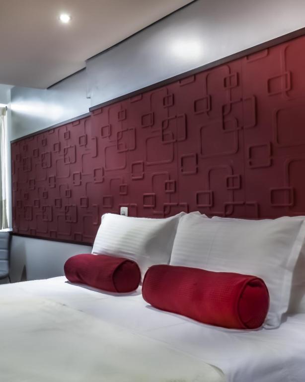 Postel nebo postele na pokoji v ubytování Hotel Florencia Plaza