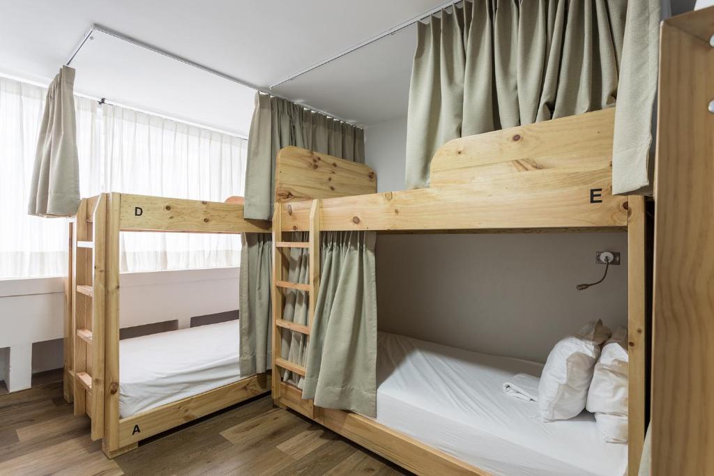 Postel nebo postele na pokoji v ubytování Hotel Florencia Plaza