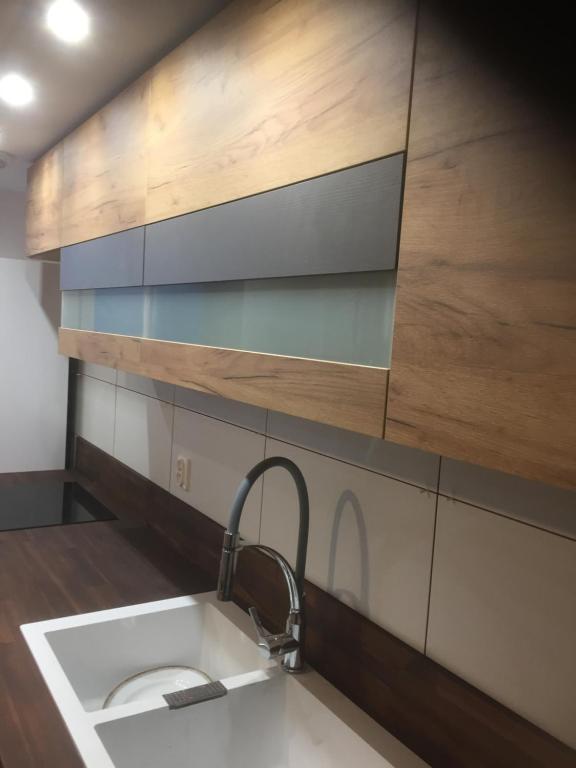 Kuchyňa alebo kuchynka v ubytovaní EkoApartmentSzklarska