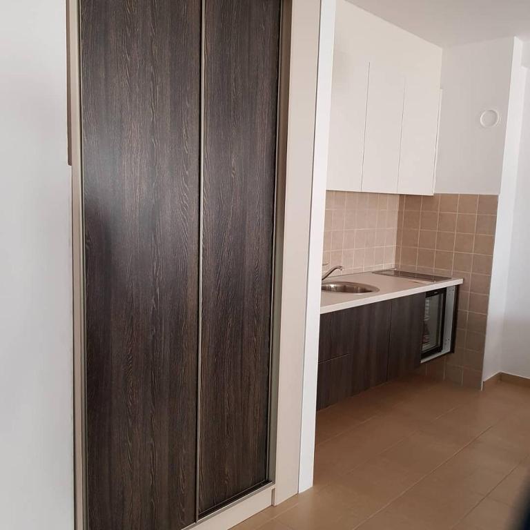 Kuchyň nebo kuchyňský kout v ubytování Apartman Ibarstar