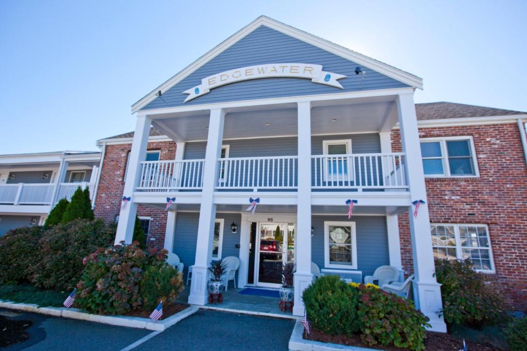 a building with a sign that reads foreclosure at Edgewater Beach Resort, a VRI resort in Dennis Port