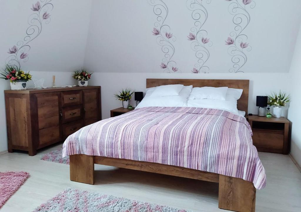 Posteľ alebo postele v izbe v ubytovaní Müezzin Apartman