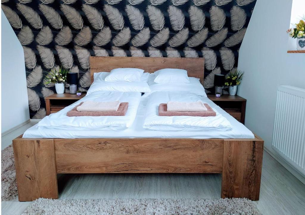 Posteľ alebo postele v izbe v ubytovaní Müezzin Apartman