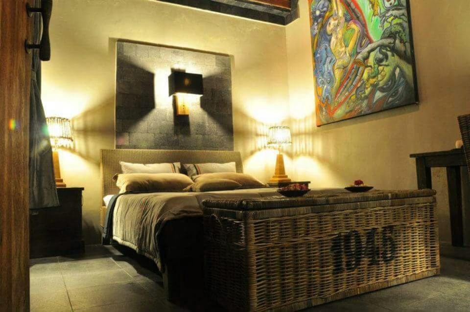 Postel nebo postele na pokoji v ubytování Astuti Gallery Homestay