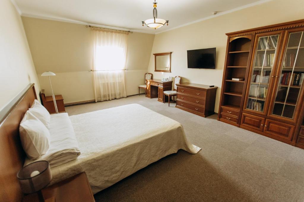 Postel nebo postele na pokoji v ubytování Stanislaviv