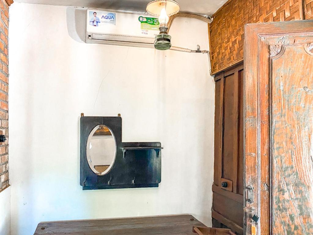 Fotografie z fotogalerie ubytování Griya Gribig Guest House Mitra RedDoorz v destinaci Malang
