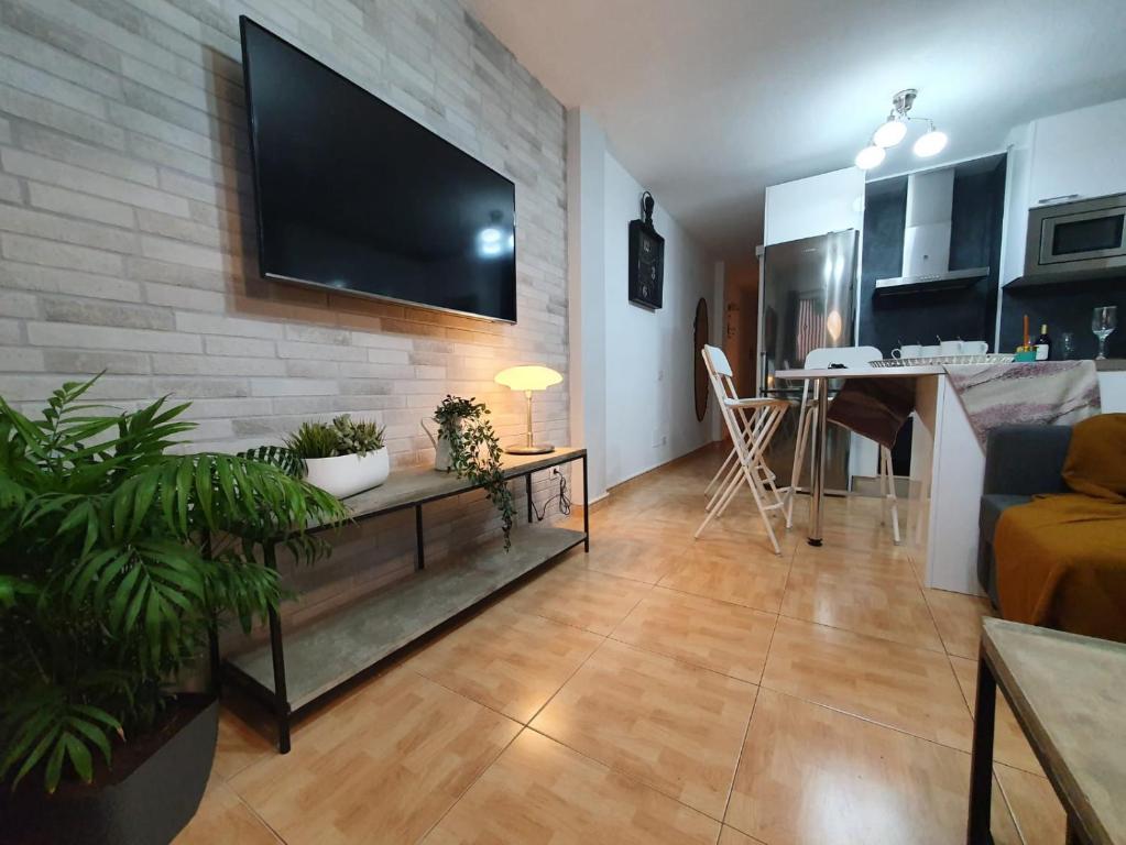 Televízia a/alebo spoločenská miestnosť v ubytovaní Surycan, beautiful apartment in maspalomas