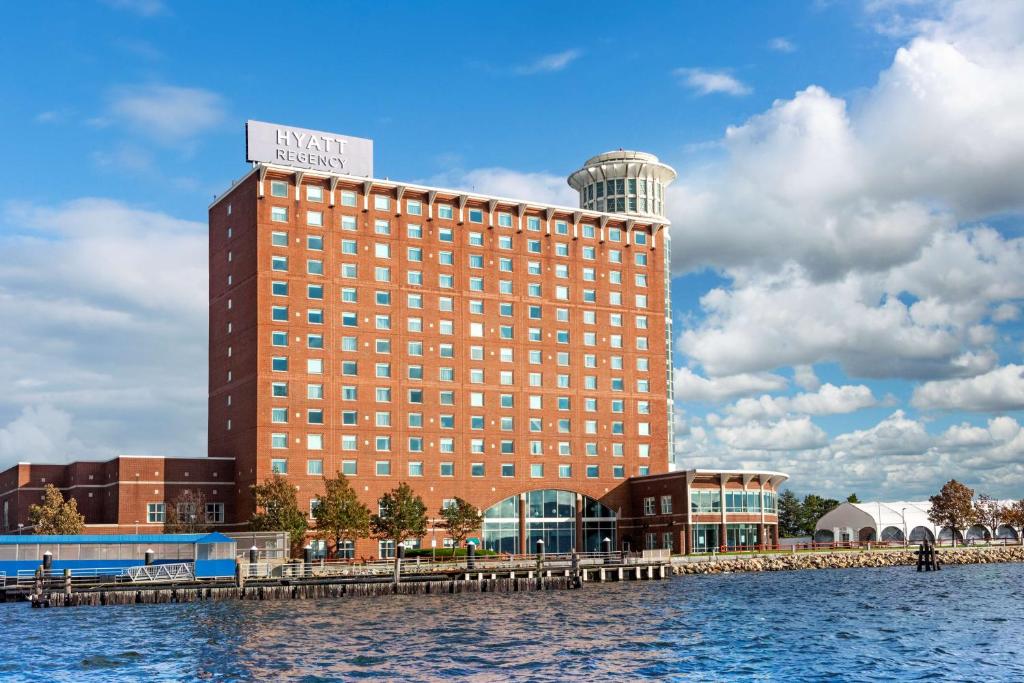 a hotel on the water next to a body of water at Hyatt Regency Boston Harbor in Boston