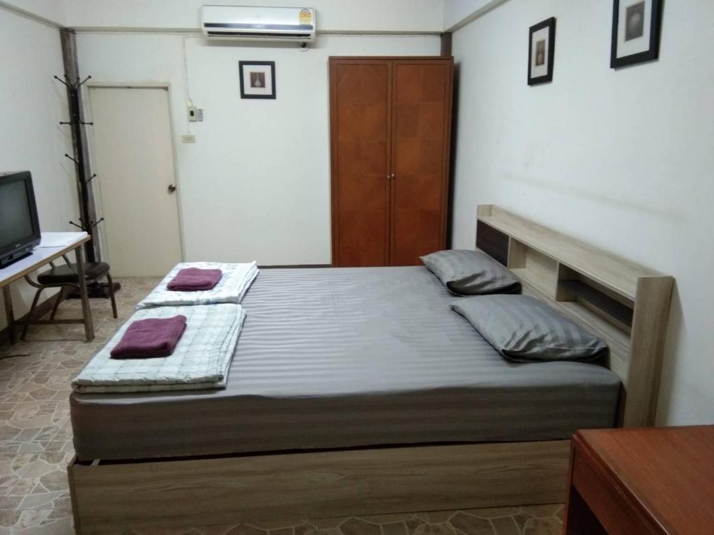 Postel nebo postele na pokoji v ubytování E2S Place