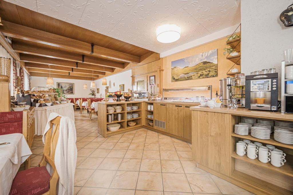 Kuchyň nebo kuchyňský kout v ubytování Hotel Finkenbergerhof