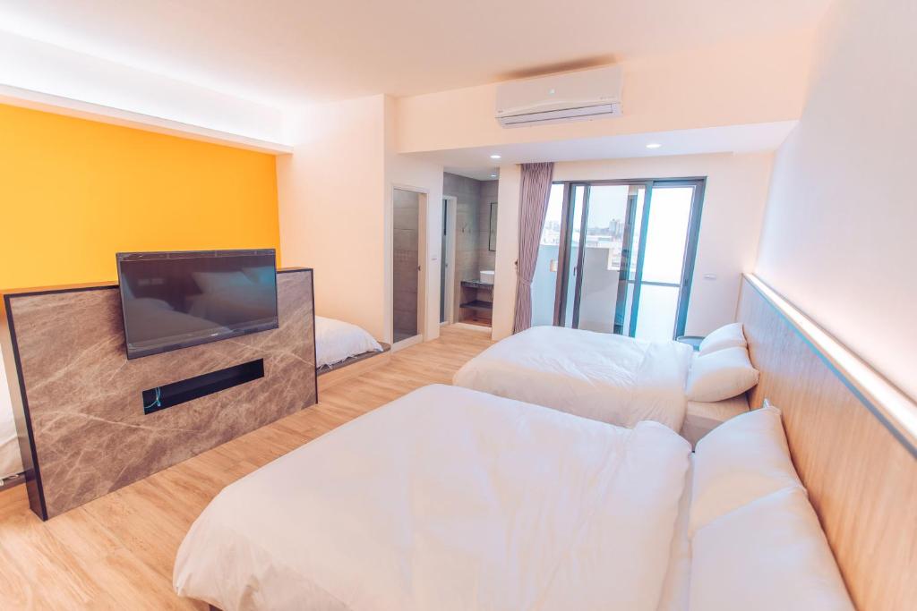 TV a/nebo společenská místnost v ubytování The Pai Hotel