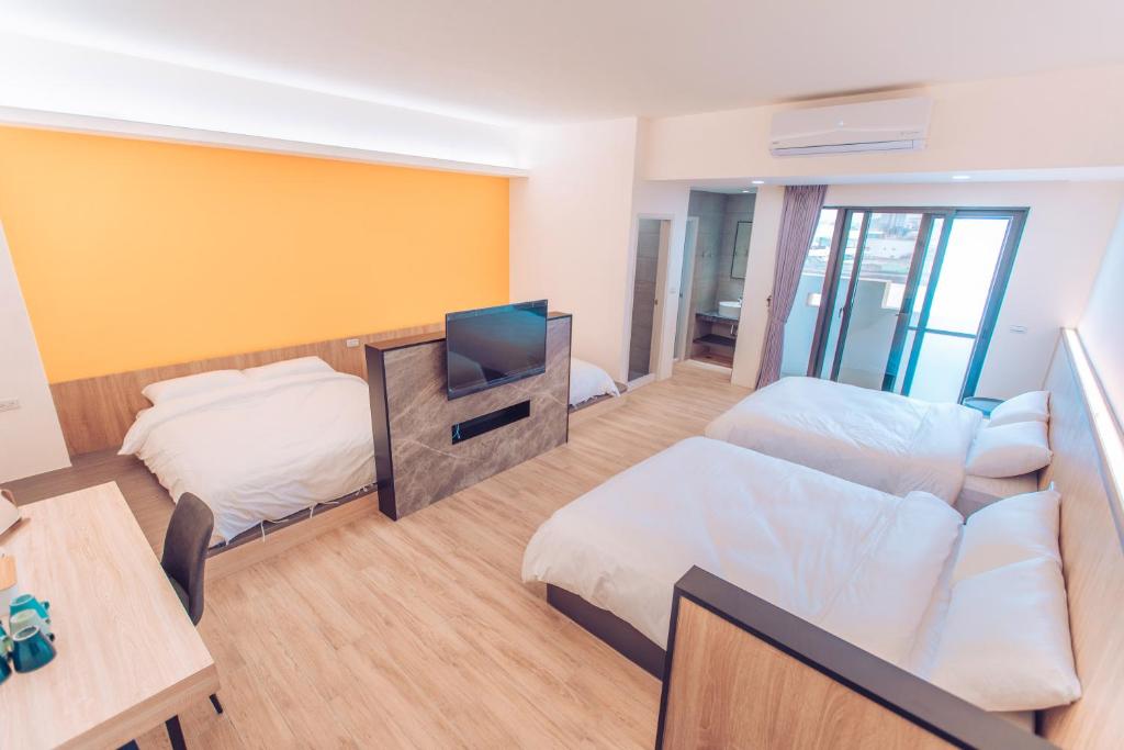 Postel nebo postele na pokoji v ubytování The Pai Hotel