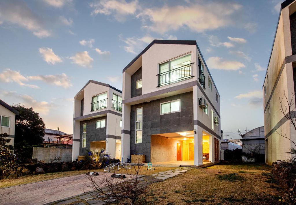 a house with a modern design at Haevichi Private Pension in Seogwipo