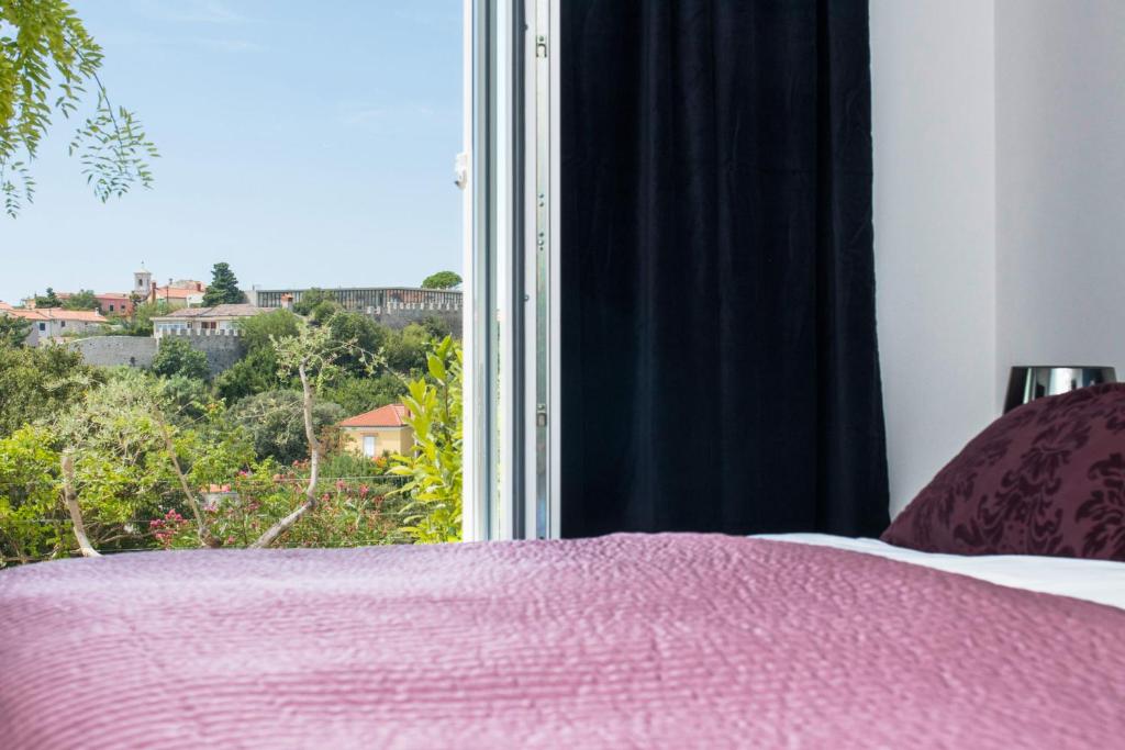 Postel nebo postele na pokoji v ubytování Marina di Portapisana Luxury private villa