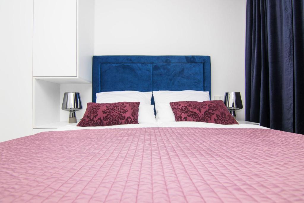 Postel nebo postele na pokoji v ubytování Marina di Portapisana Luxury private villa