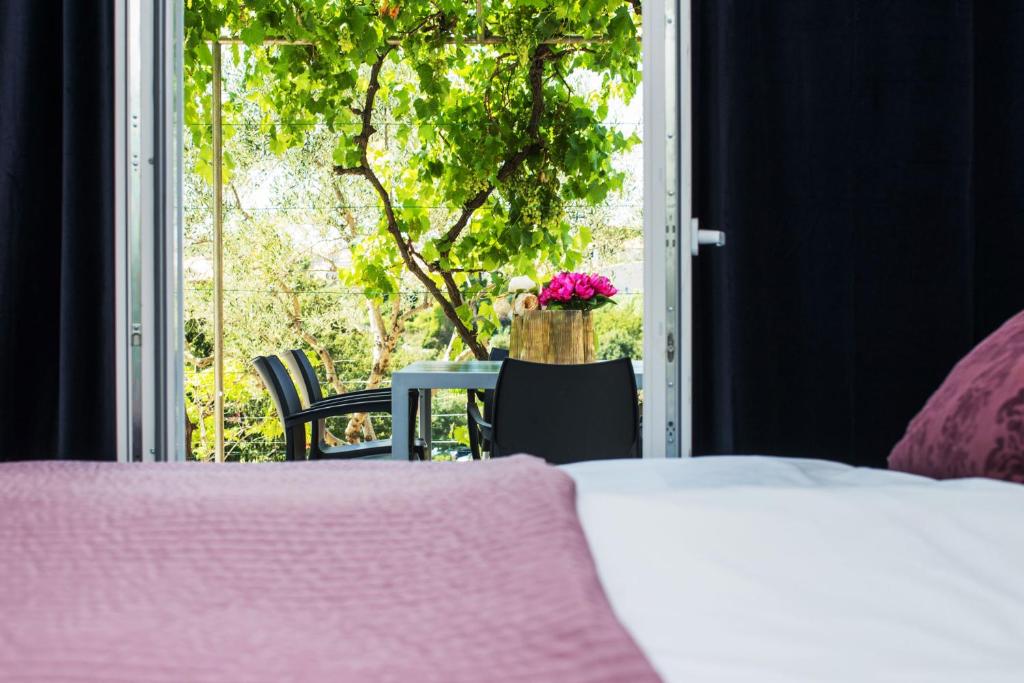 Postel nebo postele na pokoji v ubytování Marina di Portapisana Luxury private villa