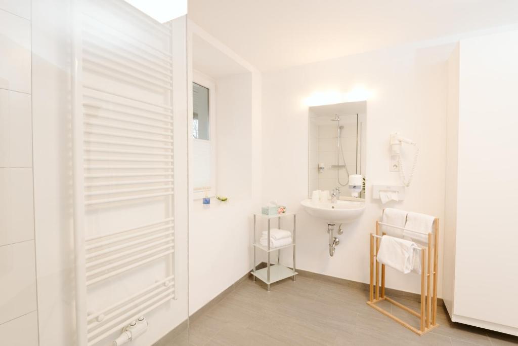 Koupelna v ubytování Velden24 - create your own stay