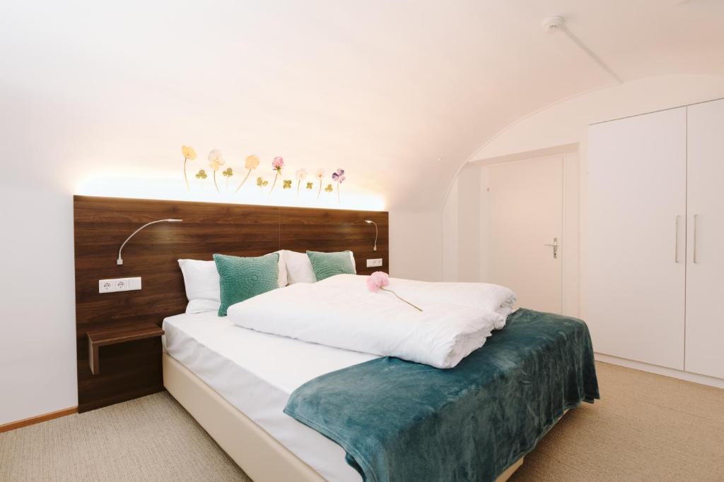 Postel nebo postele na pokoji v ubytování Velden24 - create your own stay