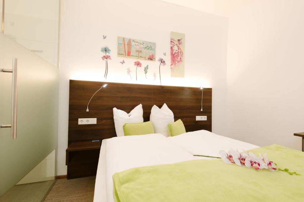 Postel nebo postele na pokoji v ubytování Velden24 - create your own stay