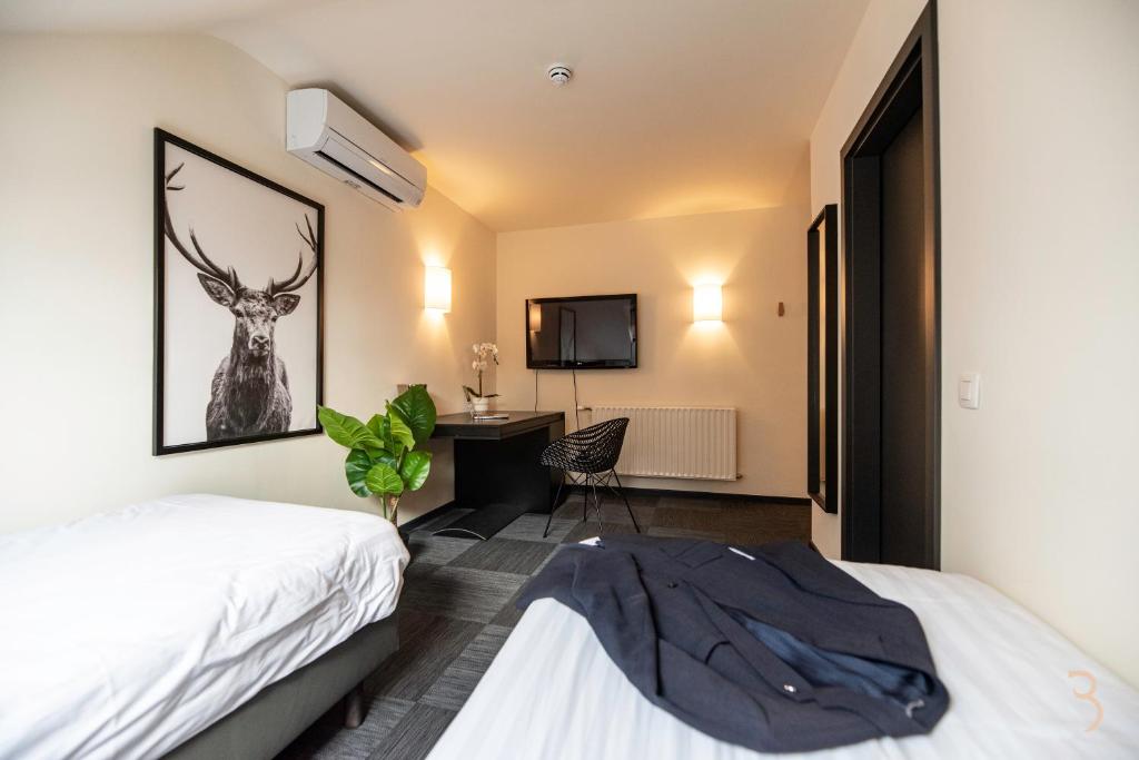 Postel nebo postele na pokoji v ubytování Smart Bnb - Hotel Battice