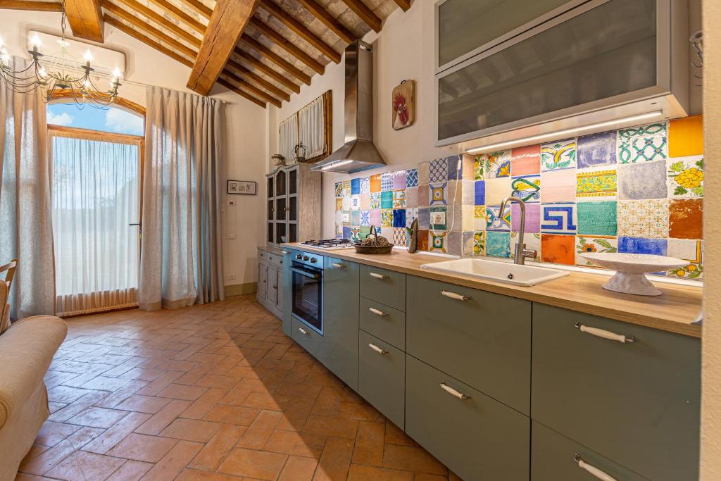 Kuchyň nebo kuchyňský kout v ubytování Agriturismo Il Segreto di Pietrafitta
