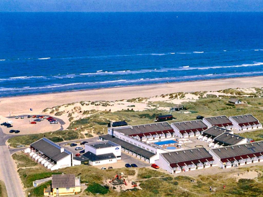 an aerial view of a resort on the beach at 6 person holiday home in Brovst in Brovst