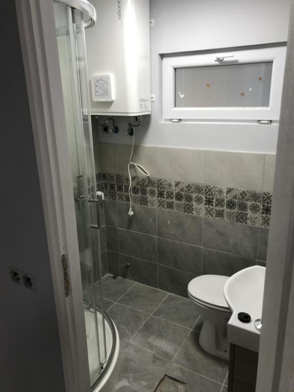 Koupelna v ubytování Dunasor1 Apartman