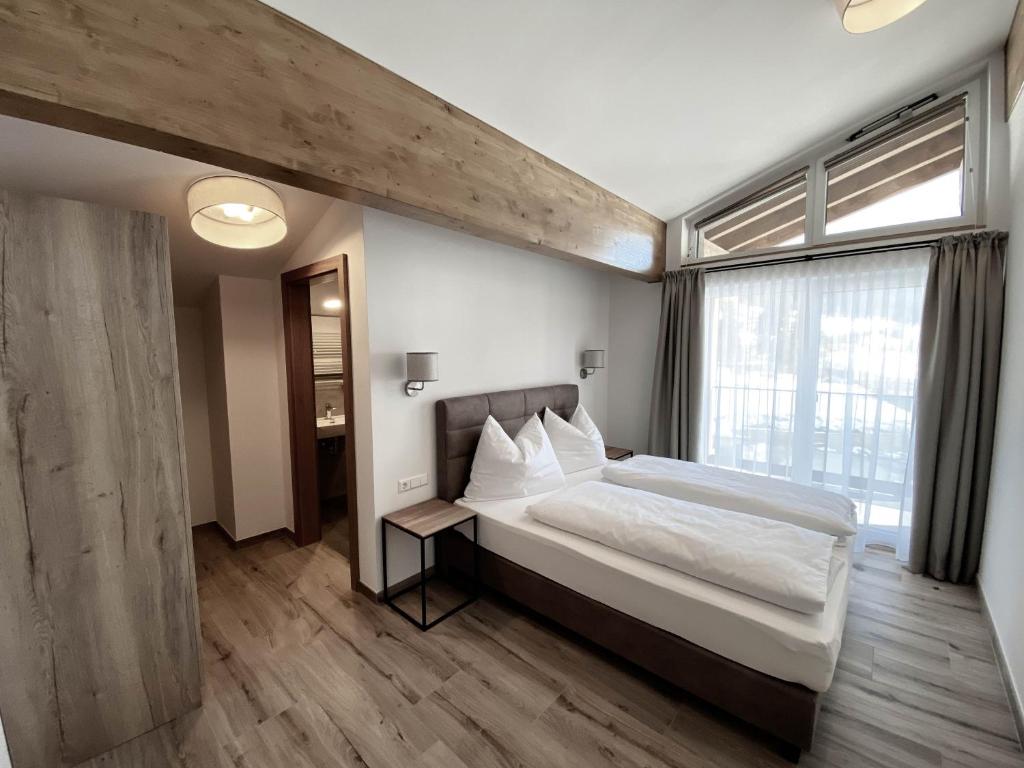 Postel nebo postele na pokoji v ubytování Appartement Tauernblick Radstadt