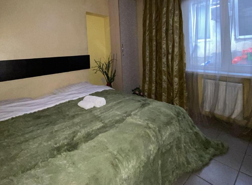 Voodi või voodid majutusasutuse Bucuresti Apartment Studio toas