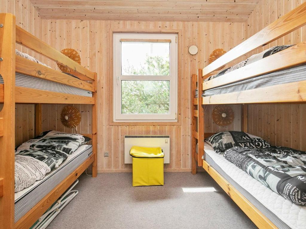 Postel nebo postele na pokoji v ubytování 8 person holiday home in Sæby-By Traum