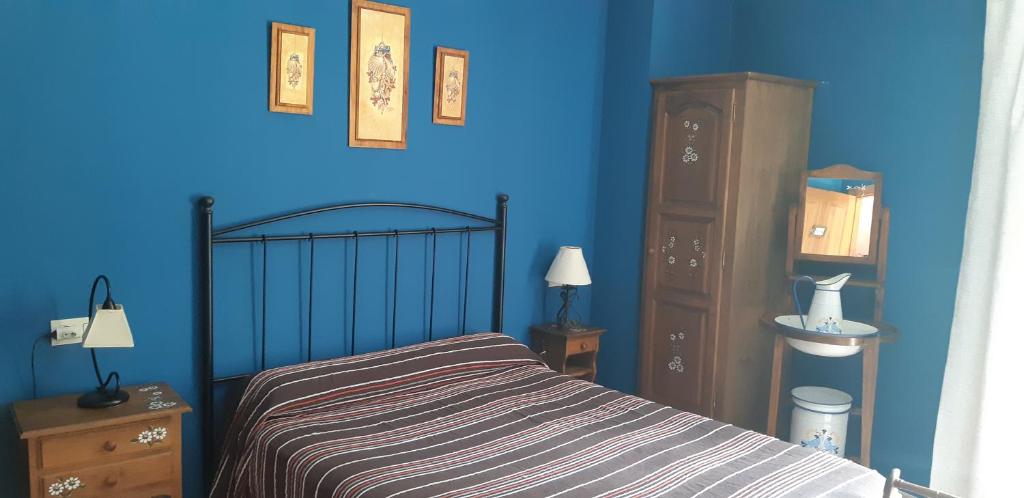 En eller flere senger på et rom på Casa Antonio y Benina