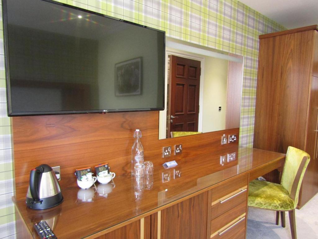 TV a/nebo společenská místnost v ubytování The Craigie Hotel